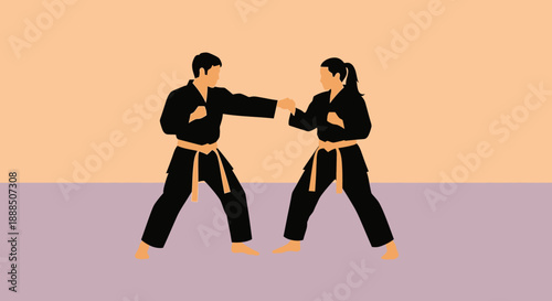 Two martial artists in black uniforms engaging in a dynamic sparring session.