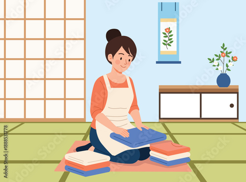happy woman folding clean laundry while sitting on tatami mats in a minimalist Japanese home interior with a traditional shoji screen.