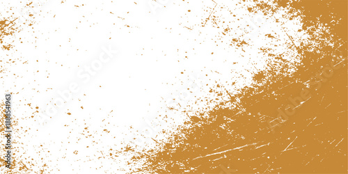 Abstract grunge backdrop featuring a golden paint splash and ink drops on an old paper texture with an artistic wall pattern design