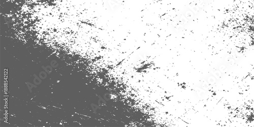 A textured black and white paint splash design featuring a grunge ink pattern with water droplets and dusty art elements on an old paper background