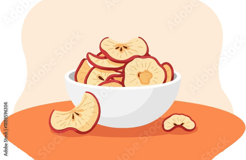 A white bowl overflowing with dried apple slices sits on an orange surface