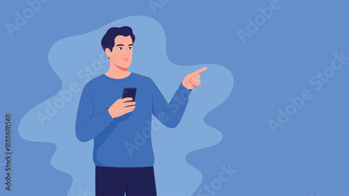 A casually dressed young man holding a mobile phone and pointing his index finger rightward