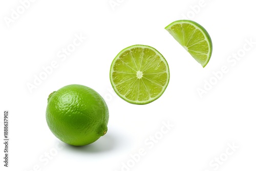 Fresh lime and slices on white background