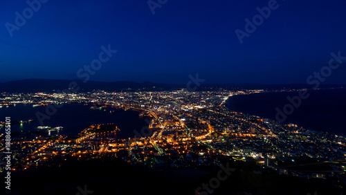 Famous panoramic cityscape of glittering illuminated streets at night (Hakodate, Hokkaido, Japan)