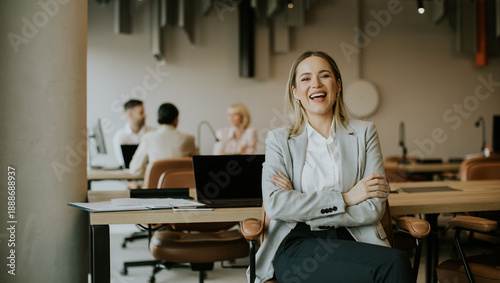 Smiling businesswoman in mo...