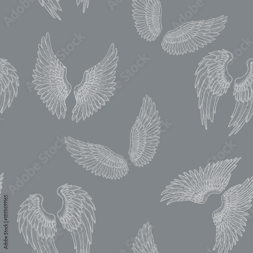 Bird wings, seamless pattern. Vector illustration. Hawk or eagle wings isolated on a gray background. Fantasy angel or griffin wings for tattoos, t-shirts, stickers, and textile printing.