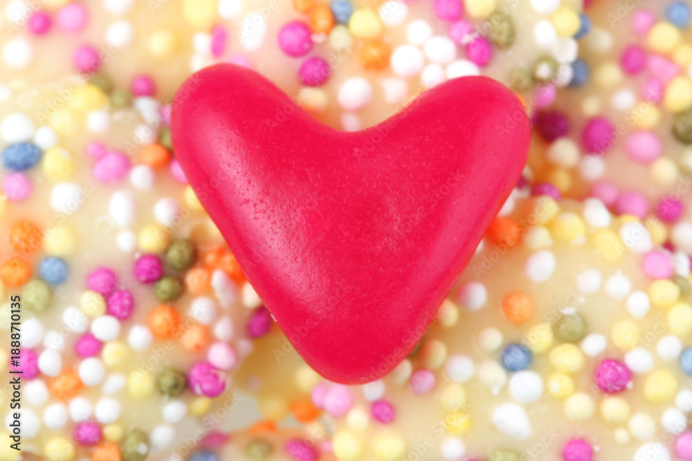 Fototapeta premium Red love heart sweet closeup with colourful little balls