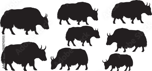 Set of rhinoceros silhouettes walking in different directions slowly