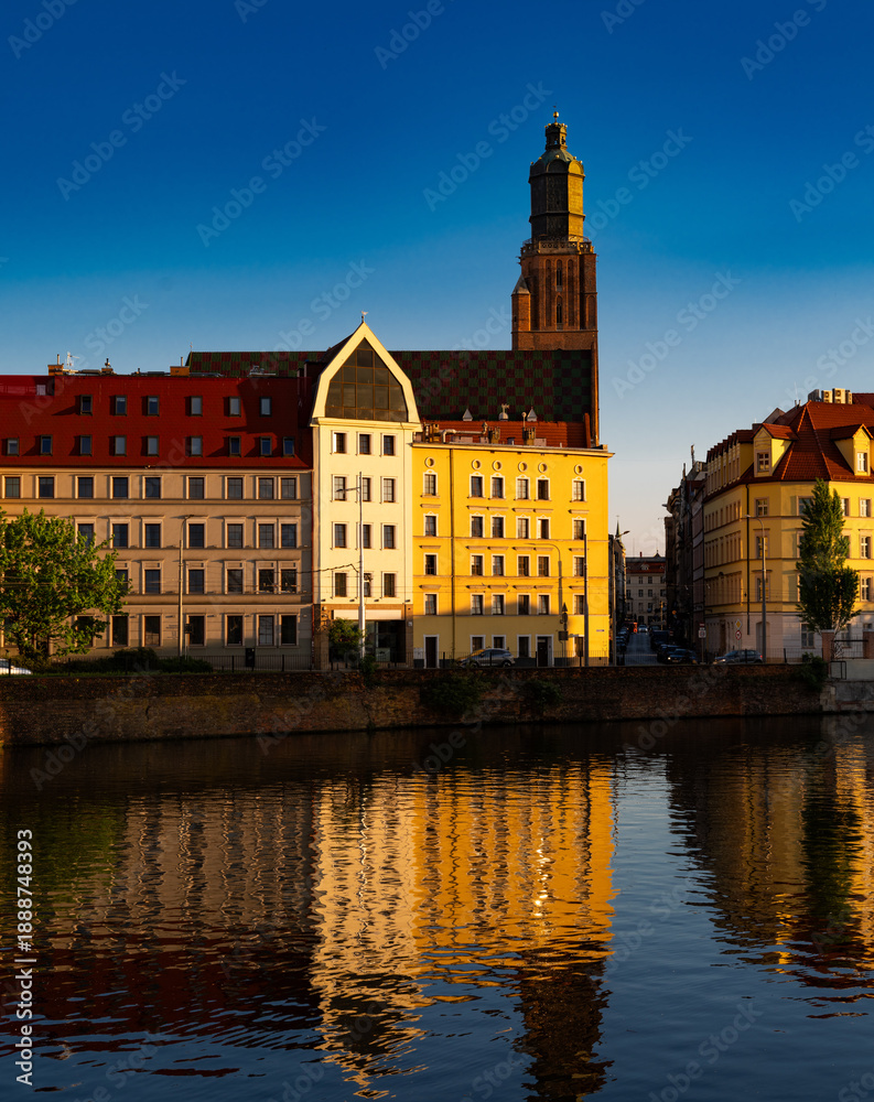 Obraz premium 2025-04-22; Wroclaw embankment at sunset in spring, Wroclaw, Poland