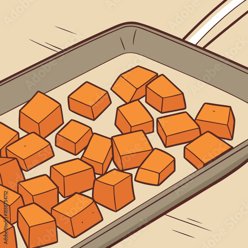 Roasted Orange Sweet Potato Cubes on Baking Sheet