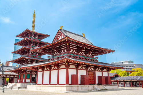 Shitennō-ji Buddhist temple, Osaka, Japan. Famous buddhist temple with a five story pagoda, statues and japanese zen garden, first built in 593 d.C.