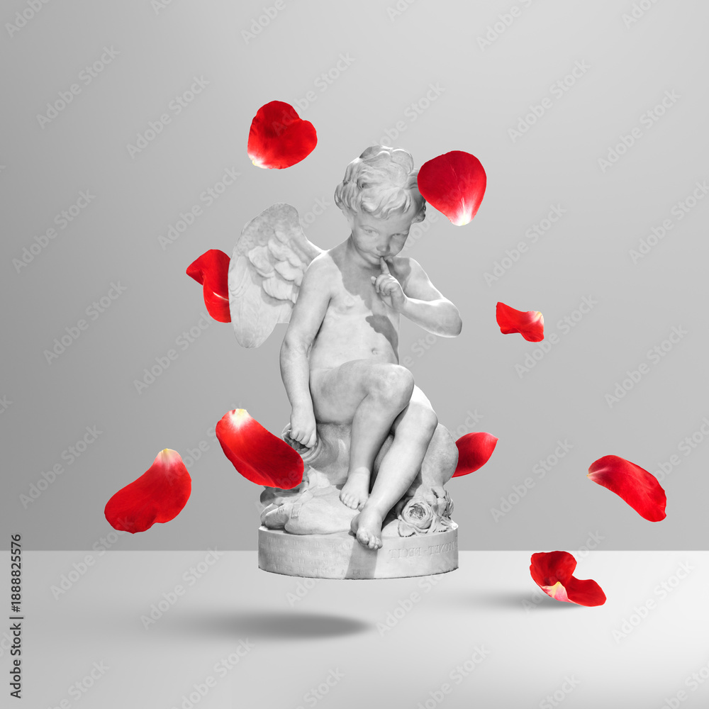 Fototapeta premium Creative art collage of plaster cherub angel statue making silence gesture and floating red rose petals on grey background. Concept of secret love, Valentine's Day and romantic surprise.