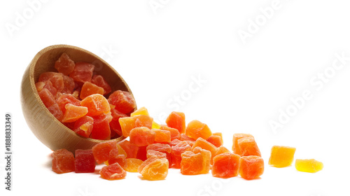 Schilderij op canvas Heap dried papaya cubes with sugar, candied fruit in bamboo bowl isolated on whi
