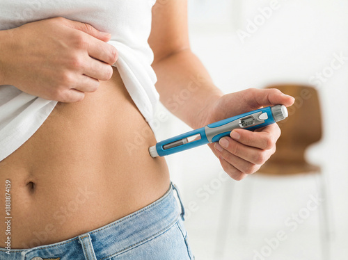 Woman Injecting Insulin or Medication into Abdomen with Medical Pen, Diabetes and Weight Loss Treatment Concept