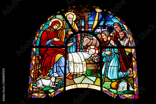 Vibrant Stained Glass Window Depicting the Nativity of Jesus Christ