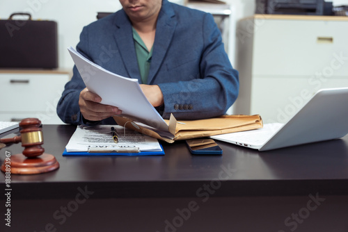 Judge, male lawyer discuss legal services for businessmen, give advice on contracts, plan court cases.