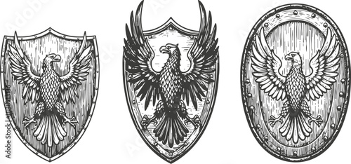 Set of three black and white vintage heraldic eagle shields with detailed line art design