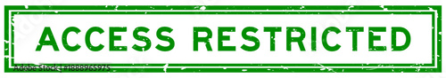 Grunge green access restricted word square rubber seal stamp on white bacckground