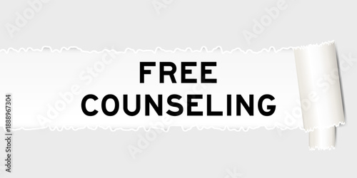 Ripped gray paper background that have word free counseling under torn part