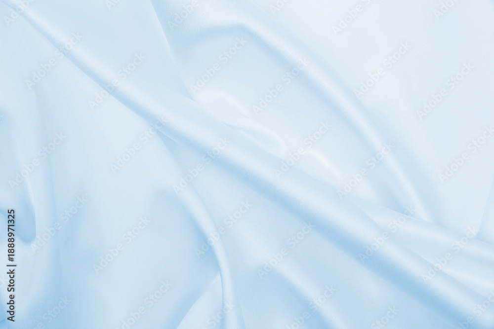 Fototapeta premium Smooth elegant blue silk or satin luxury cloth texture as abstract background. Luxurious background design