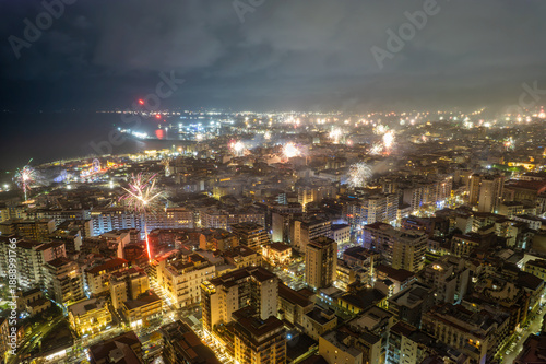 Wallpaper Mural Aerial nighttime cityscape with fireworks exploding at new year, Catania, Sicily, Italy Torontodigital.ca