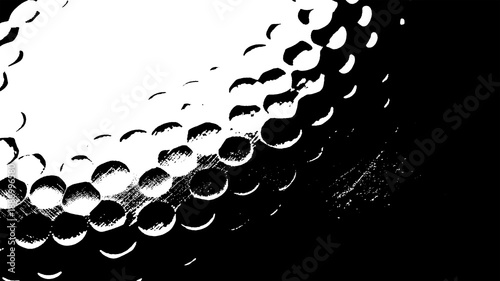 Tableau sur toile Close-up of a golf ball's dimpled surface in black and white, abstract sports or