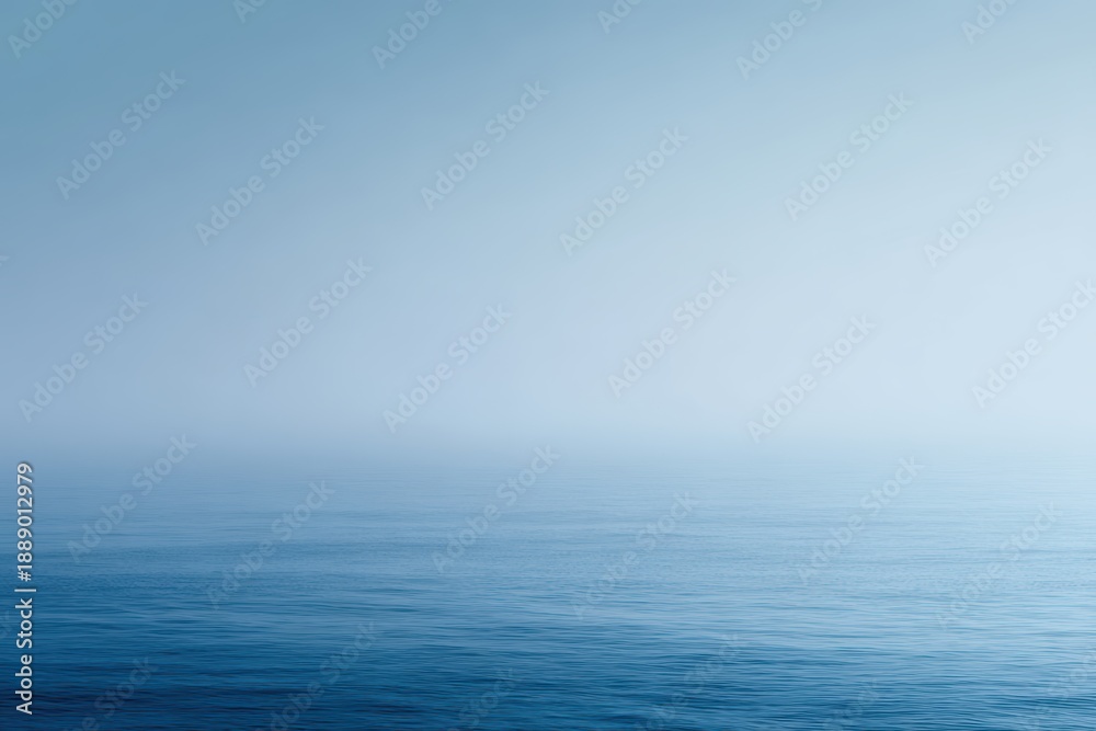 Obraz premium Minimalist foggy blue sea and sky, soft gradient tones, calm atmosphere, copy space