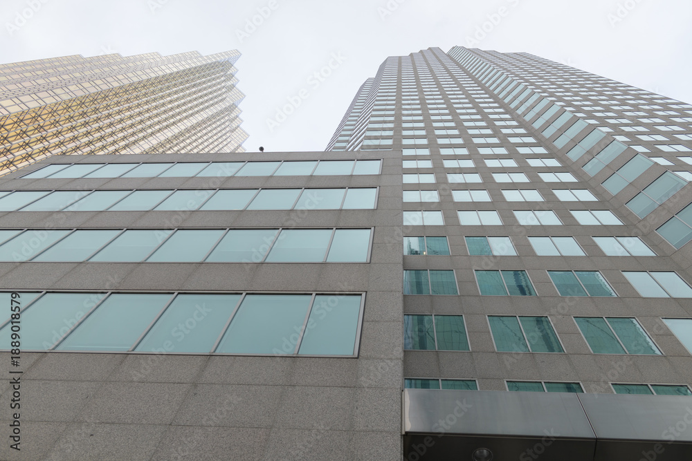 Fototapeta premium oblique skyward view of TD Canada Trust Tower, a business center, located at 161 Bay St, Toronto (shown here on Front St W) and Royal Bank Plaza (left)
