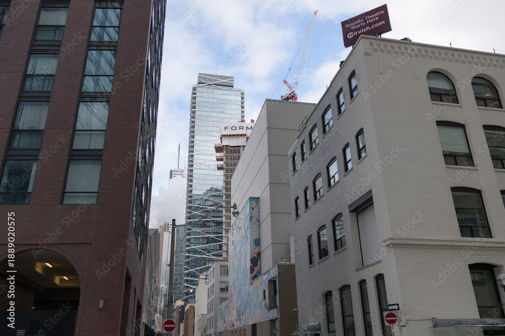 Fototapeta premium looking east on Pearl St to the Mirvish complex of buildings (Princess of Wales Theatre), from John St, Toronto