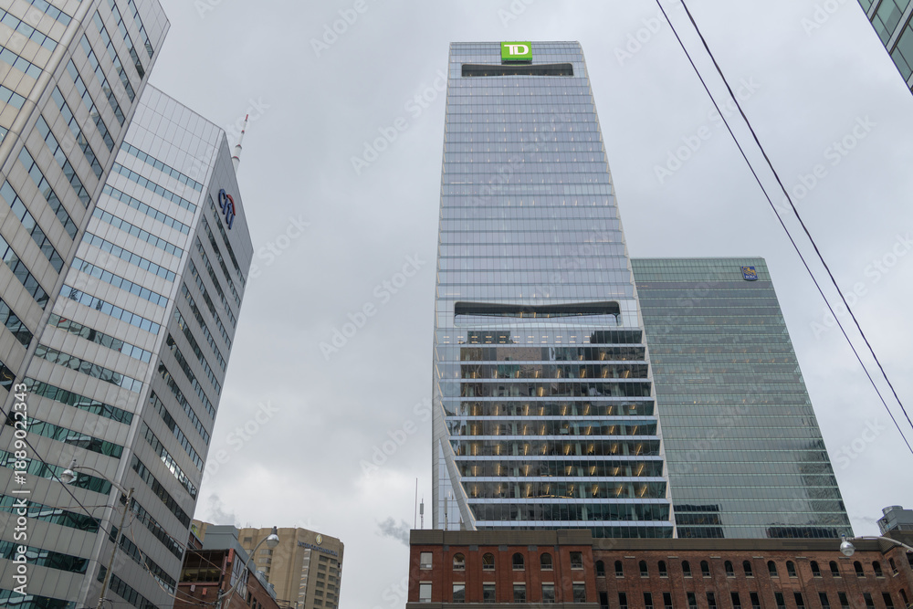 Fototapeta premium skyward view of TD Terrace, a corporate office, and Citigroup Place, a business center, looking west on Front St W at University Av, Toronto