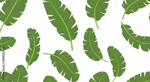Seamless tropical pattern of green banana leaves scattered on a white background for exotic summer fashion and wallpaper designs.