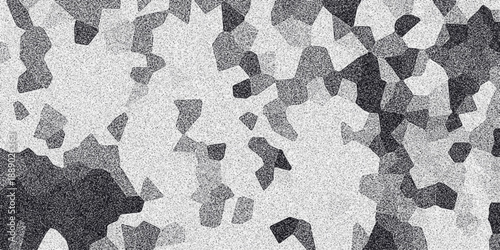 Abstract grayscale geometric mosaic pattern with speckled texture and irregular polygon shapes creating a textured background for design and digital art applications