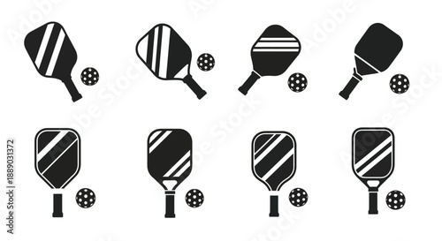 Black and white illustration of pickleball paddles and balls in various arrangements