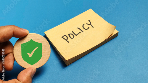 Canvas Print Corporate policy compliance and security protection concept with hand holding gr