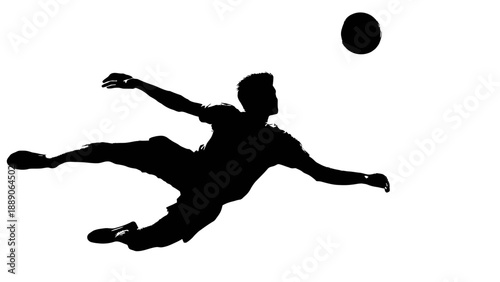 Silhouette of a player kicking a ball in mid-air action shot