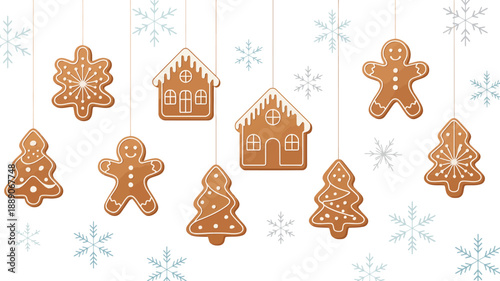Gingerbread cookies hanging on strings with snowflakes