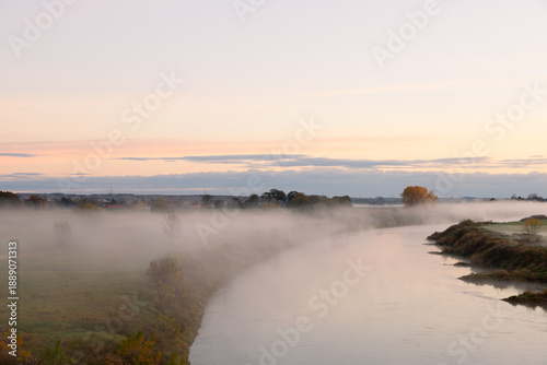 Fog in the early morning. Dawn by the river.
