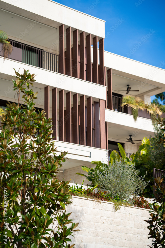 Fototapeta premium Building exterior with plants on the facade