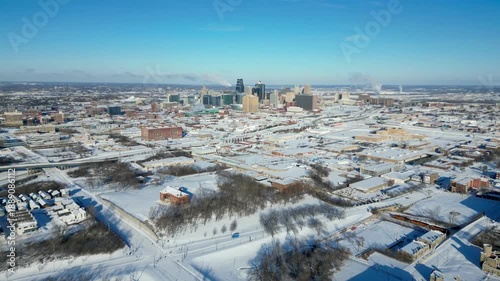 Flying over snowy city