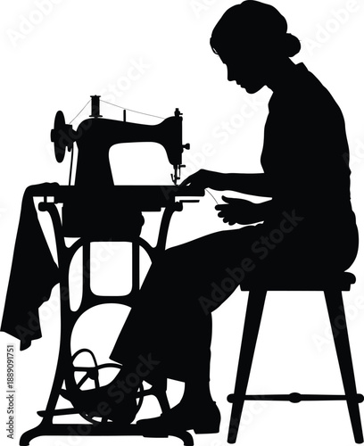 Silhouette of a person sewing on a sewing machine