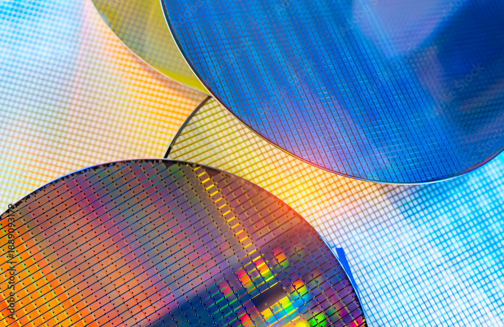 Naklejka premium Silicon Wafers and Microcircuits used in electronics for the fabrication of integrated circuits.