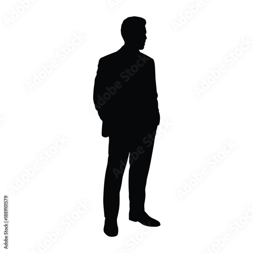 A solitary silhouette of a man in a suit standing indoors