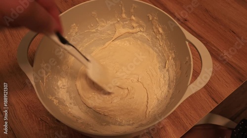 Wallpaper Mural Little child mixing homemade pizza dough in a plastic bowl in the kitchen Torontodigital.ca