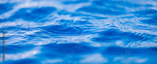 Canvas Print blue water background. Deep and dark turbulent sea or ocean water