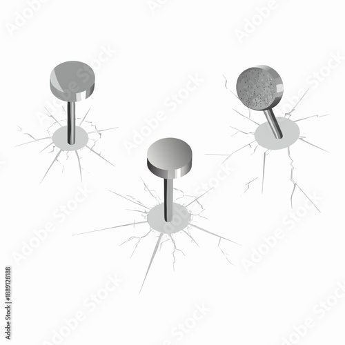 Three silver push pins causing cracks in a white surface