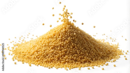 Golden-yellow couscous grains piled high, with individual pieces falling and scattering on a clean white background.