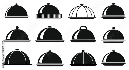Collection of black and white serving dishes with decorative covers