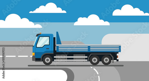 Blue Flatbed Truck Driving on a Road Under a Cloudy Sky