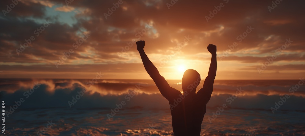 Fototapeta premium Athlete Celebrating Victory at Sunrise by Ocean Waves in Cinematic Light