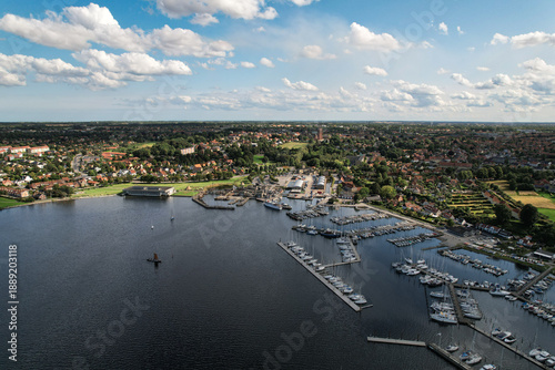 Tableau sur toile Center-Framed Drone Shot of Traditional Nordic Longboat at Sea